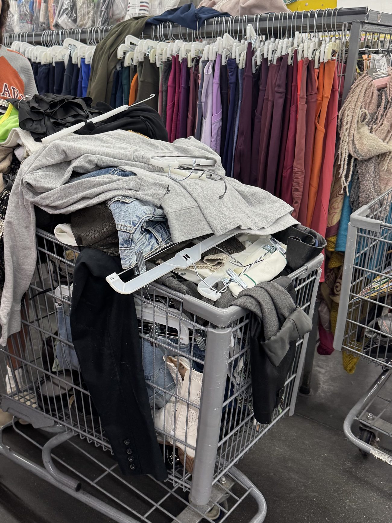 Racks of clothes at a thrift store